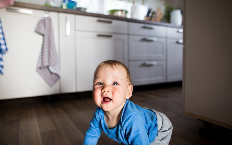 baby playing pest control image