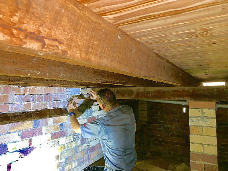 inspecting termite bait station image